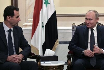 الأسد يهنئ بوتين بعيد النصر